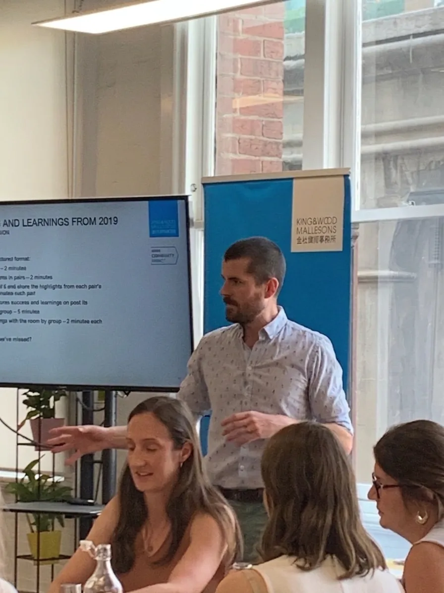 Tim presenting at the King & Wood Mallesons Community Impact strategy session