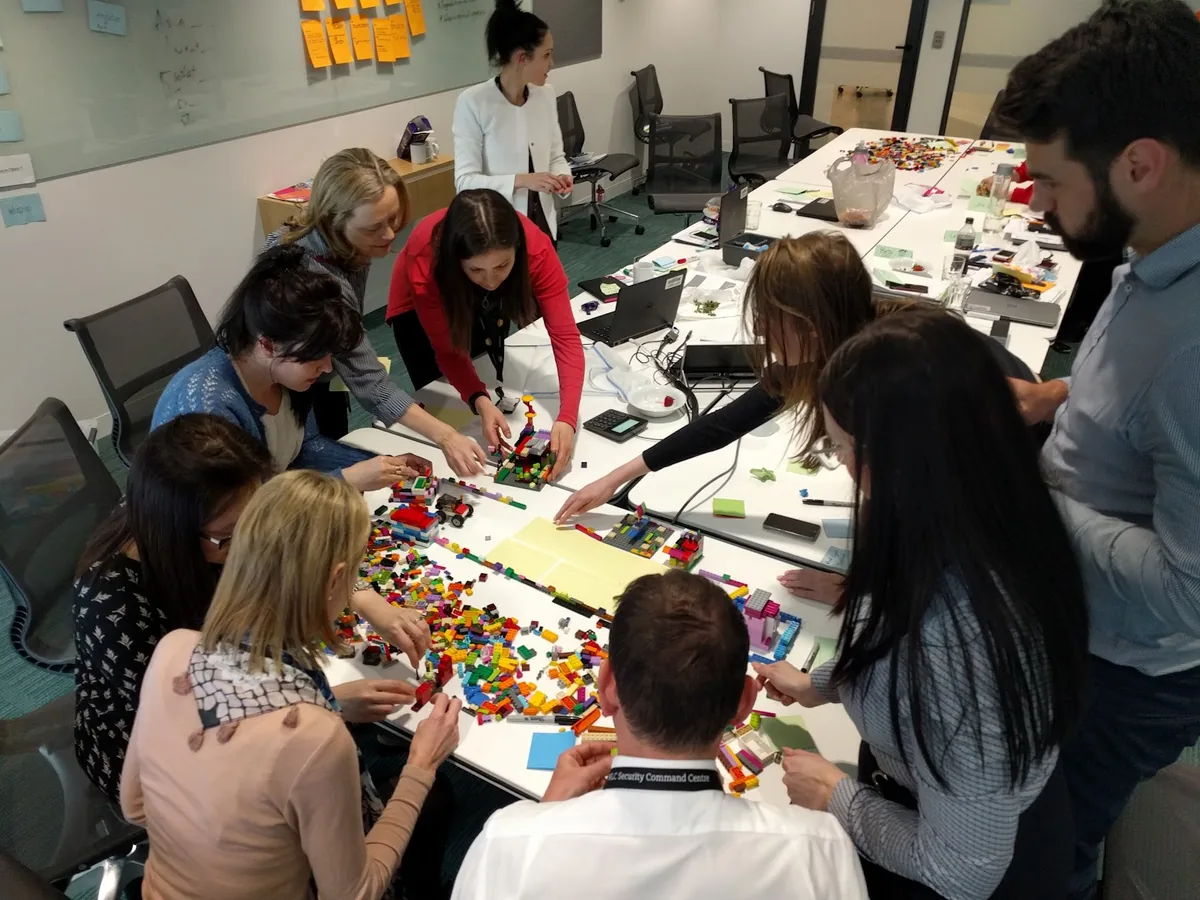 MLC Life leaders running a Lego-based reflection workshop